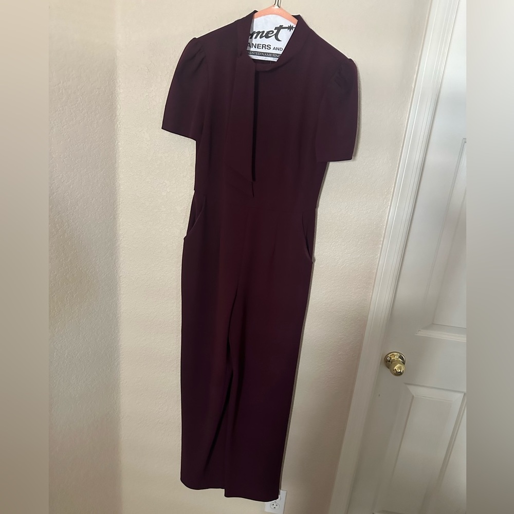 Plum jumpsuit with high collar